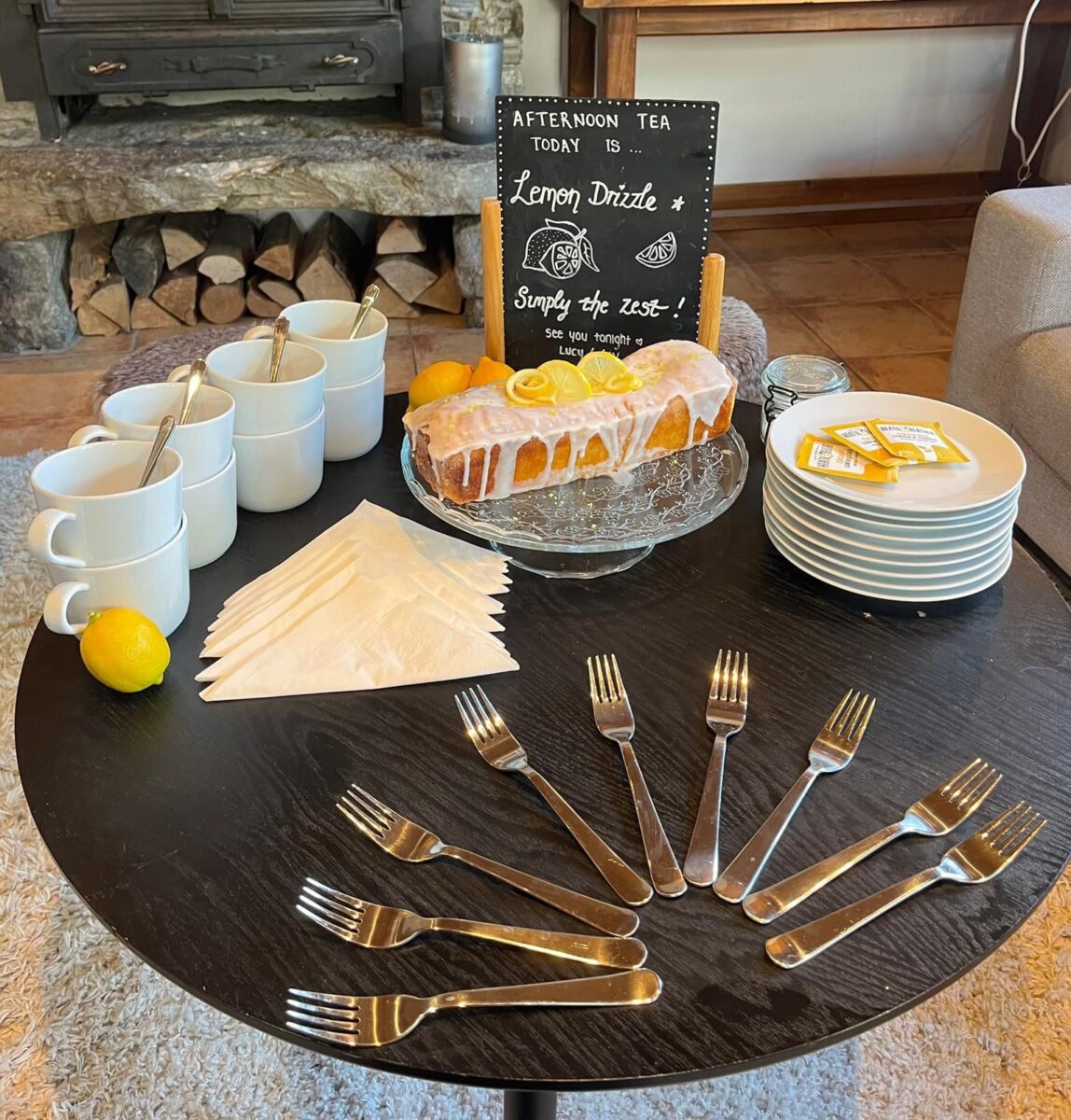 Freshly baked afternoon tea lemon drizzle cake laid out for guests in Ski Basics catered ski chalet in Meribel