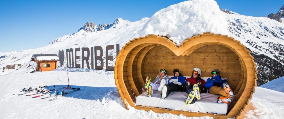 Uncovered: Meribel’s Best Ski Runs – Local Secrets for Avoiding the Crowds 1 Group of skiers relaxing after high altitude skiing in Meribel