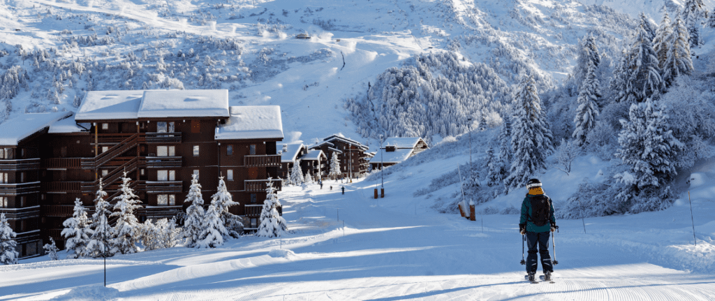 How to Book a Ski Holiday: A Step-by-Step Guide 3 how much does a ski trip cost? A complete guide to ski holiday cost in Meribel. Skier skiing down into Meribel