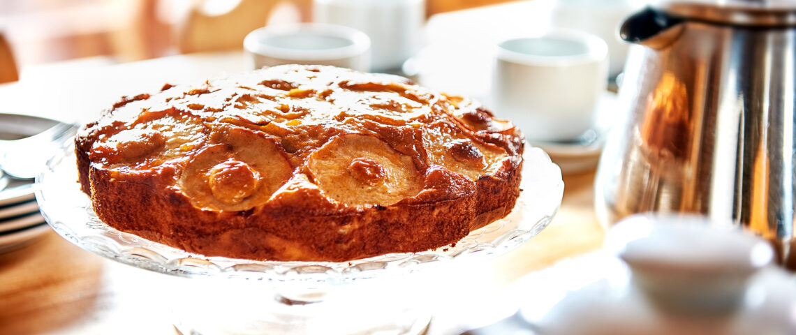 Freshly baked cake laid out for afternoon tea in ski basics chalet