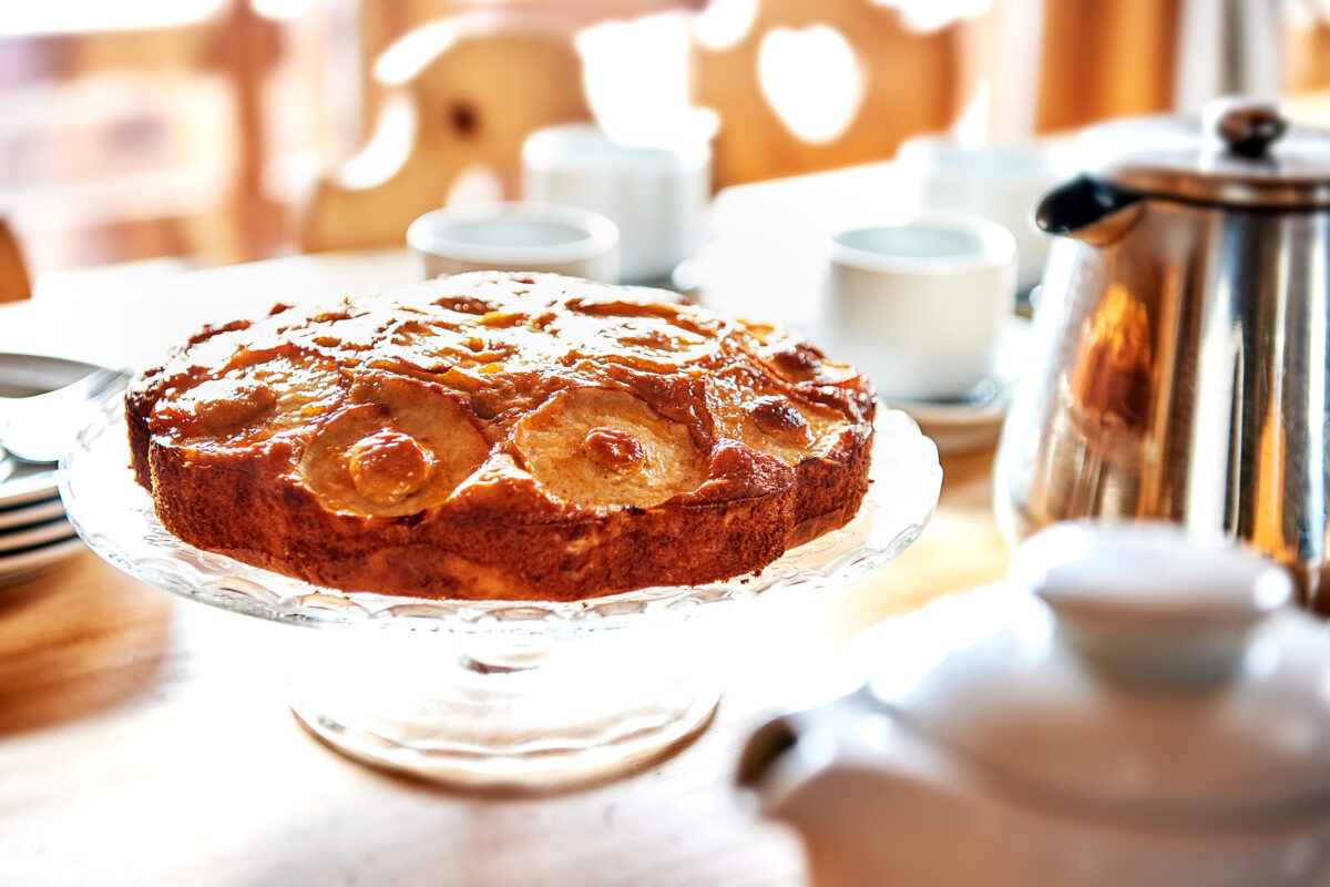 Freshly baked cake laid out for afternoon tea in ski basics chalet